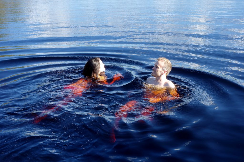 swimming in a peat bog in Lahemaa National Park outside of Tallinn, Estonia